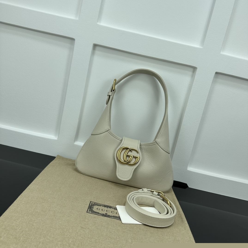 G*u*i top handle bags